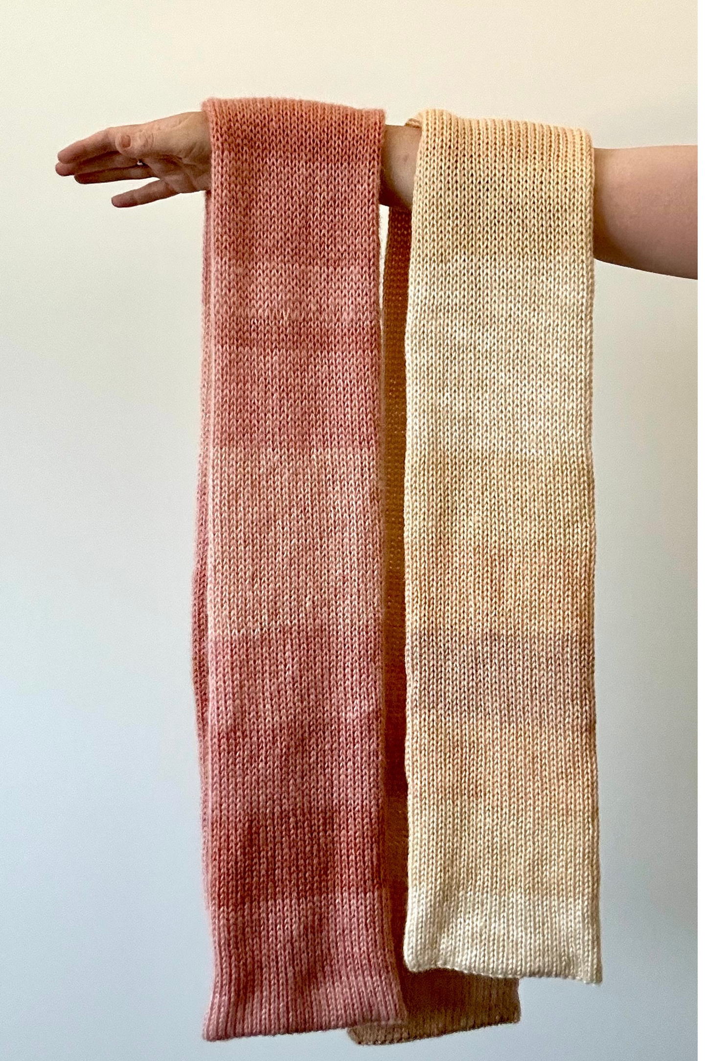 Soft and cozy knitted scarf in muted ombre shades