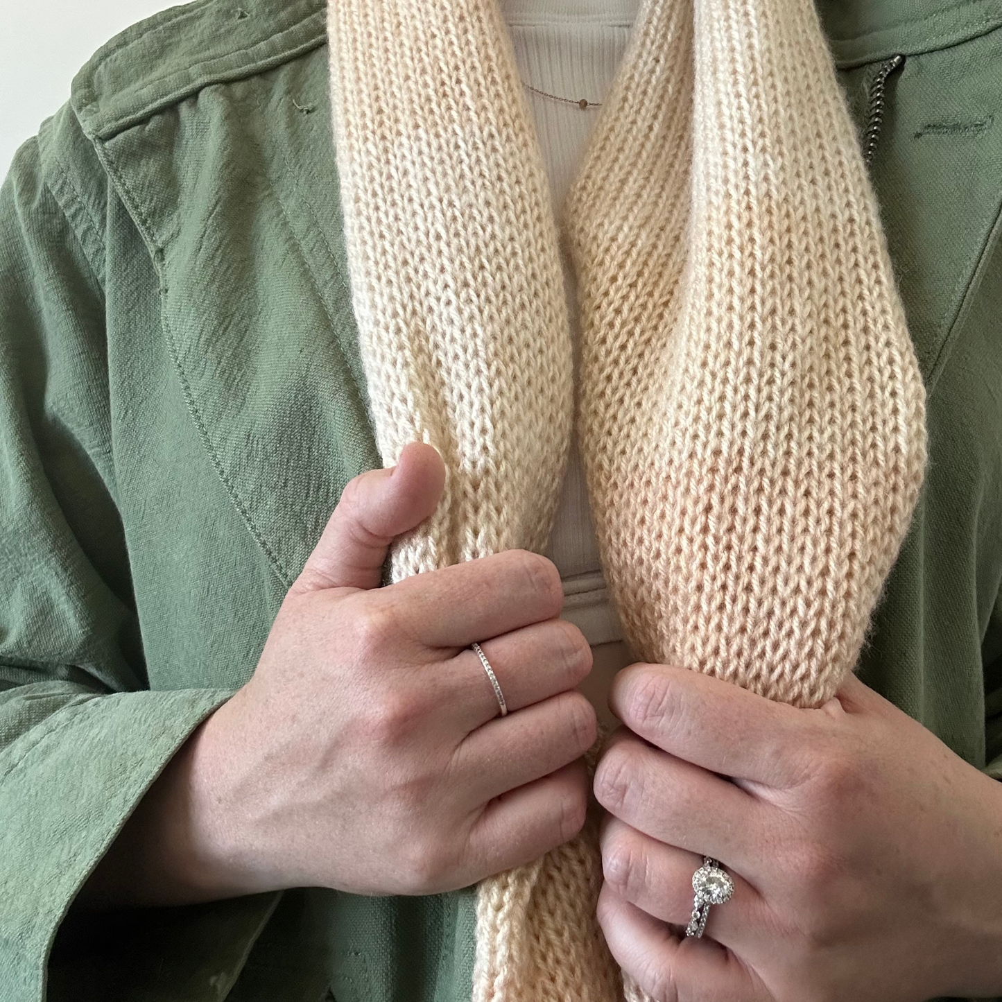 Soft and cozy knitted scarf in muted ombre shades