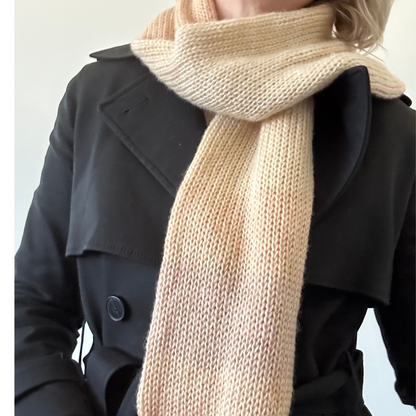 Soft and cozy knitted scarf in muted ombre shades