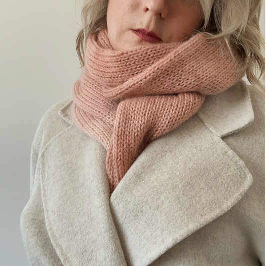 Soft and cozy knitted scarf in muted ombre shades